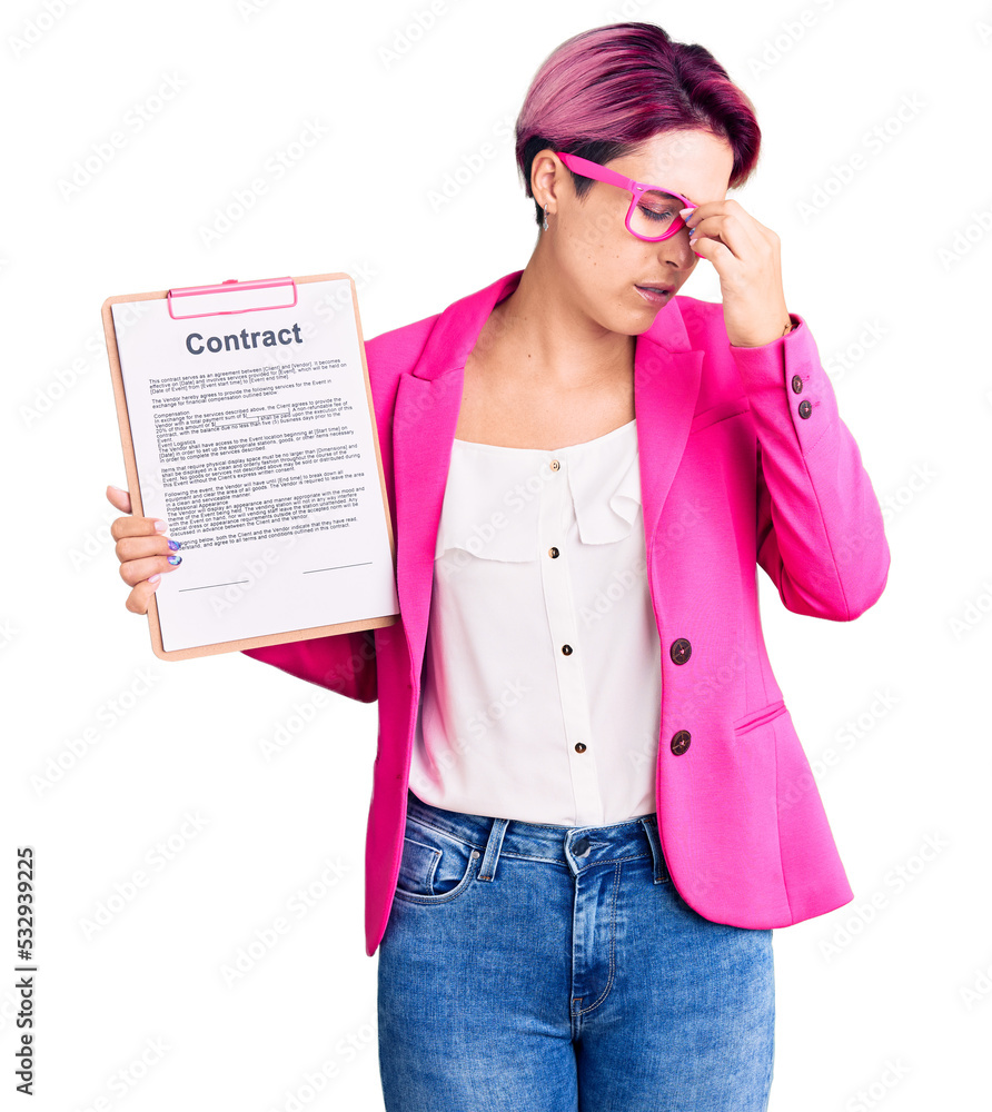 Sticker young beautiful woman with pink hair holding clipboard with contract document tired rubbing nose and