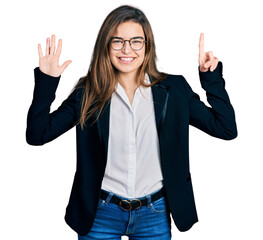 Young caucasian girl wearing business style and glasses showing and pointing up with fingers number six while smiling confident and happy.