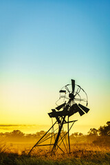 Broken Windmill at Sunrise