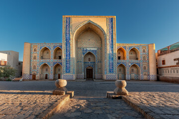 Fototapeta na wymiar Ancient heritage Abdulaziz Madrasah colorful facade in historical centre Bukhara Uzbekistan