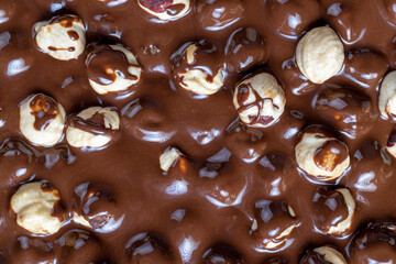 real milk chocolate while cooking with hazelnuts