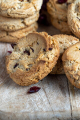 delicious dried cookies made of high-quality flour with dried red cranberries on the table