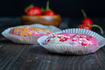 round donuts in glaze and with berry filling