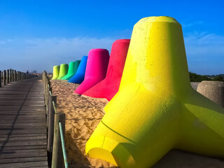 Breakwaters in a row in different colors 