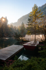 Obraz premium Blausee , beautiful turquoise nature lake in Bernese Oberland, Kandergrund during autumn , winter morning : Blausee , Switzerland : December 4 , 2019