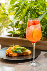 fresh lemonades from different fruits in a glass