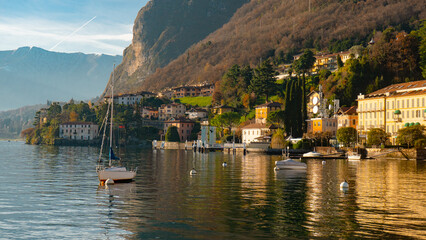 Fototapeta na wymiar Menaggio , beautiful town on the shore of Lake Como , Lombardy . during autumn , winter sunny day : Lake Como , Italy : December 7 , 2019