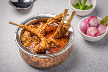 Mutton curry or Mutton gravy is a delicious Indian curried dish of soft tender chunks of meat in spicy onion tomato gravy