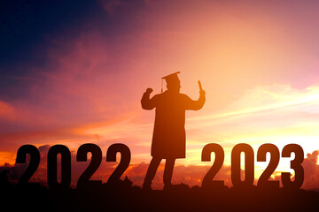 2023 New year Silhouette young man graduation in 2020 years education congratulation concept ,Freedom and Happy new year