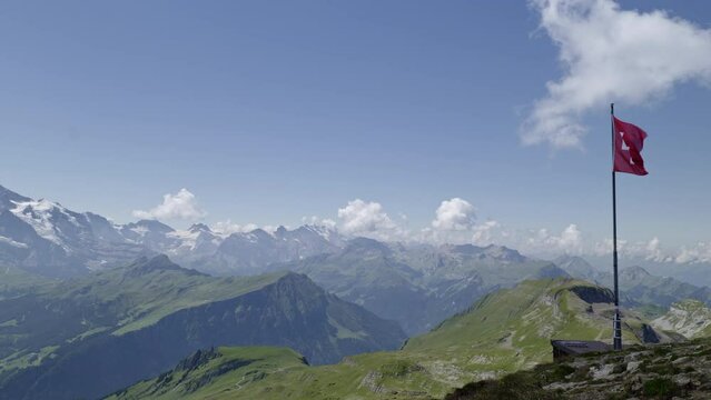Flag of Switzerland and panorama of the Alps. Faulhorn. Panasonic Lumix S1 ProRes422HQ (4K, 29.97fps, Vlog basic color correction)