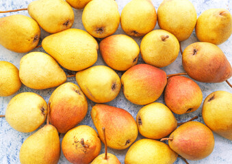 Beautiful juicy pears on a blue background