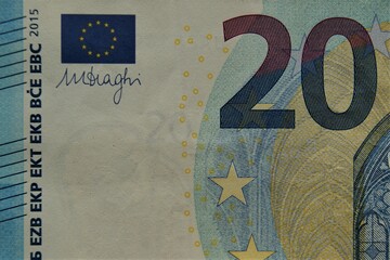 Fragment of a 20 euro banknote with the flag of the European Union.