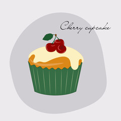 Cupcake with cherry and white icing