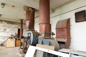 An old abandoned hall with ventilation equipment