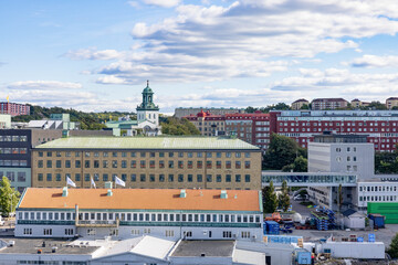 Naklejka premium View of Gothenburg harbor with residential buildings, office buildings and Tower of Carl Johan's Church.Carl Johan's Church is a Swedish parish church on Sagberget ,Sweden,Scandinavia,Europe,