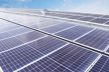 Solar panels on the sky background.