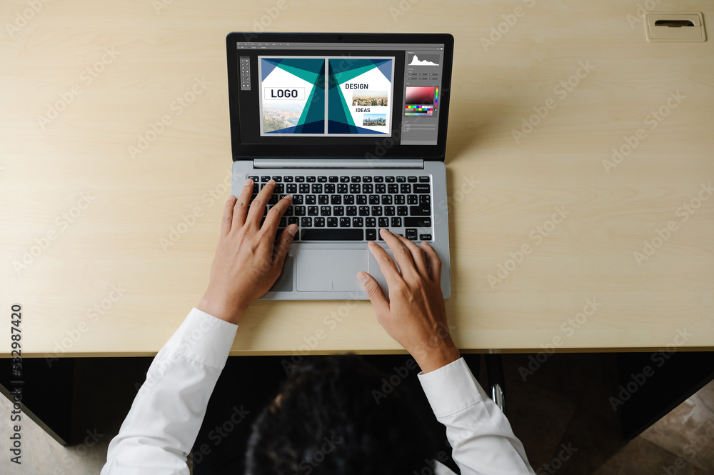 Aufkleber graphic designer software for modern design of web page and commercial ads showing on the computer s