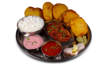 Chicken thali Served in a plate over white background. Selective focus.