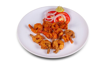 prawns fry Served in a plate over white background. Selective focus.