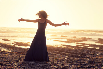 Beautiful Romantic Woman Dancing By The Sea