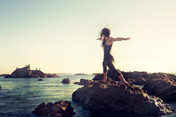 Yoga Warrior by the sea.