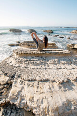 Fototapeta na wymiar Sitting Yoga Balance By The Ocean