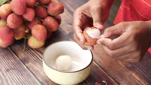 taking skin off a Lychee top down.