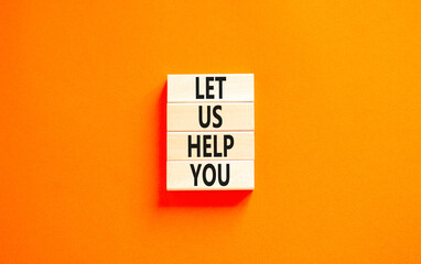 Support and let us help you symbol. Concept words Let us help you on wooden blocks on a beautiful orange table orange background. Business, support and let us help you concept.