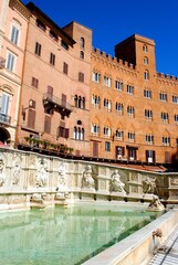 Fountain and building in Piazza del Campo, Siena Italy