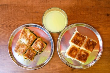 Table scene of assorted take out or delivery foods. Traditional Turkish cuisine. Various Turkish meal and appetizers. Top down view on a table.