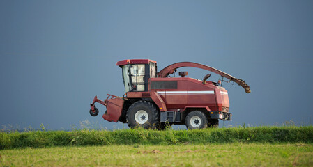 combine harvester isolated on gray background