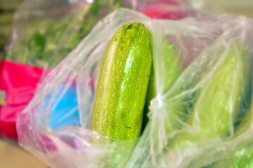 Shopping for vegetables and colorful products. in the center of zucchini. From the supermarket,...