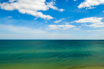 tropical summer beach with sun. Vacation and travel concept.
