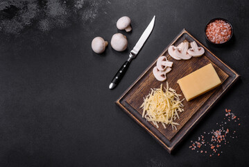 Raw pasta, mushrooms, onions, mince, spices and herbs to make a delicious paste