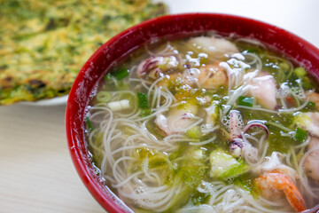 Seafood rice noodle soup bowl
