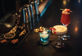 photo of a cocktail shown in a moody cocktail bar without bartender