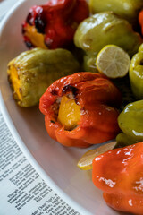 stuffed green and red bell peppers with olive oil, lemons and rice