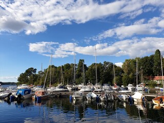 Fototapeta na wymiar Boats on the swedish coast in beautiful weather