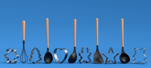 Set of metal cookie cutters and wooden kitchen utensils on blue background