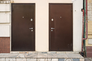 Obraz na płótnie Canvas Two metal doors on facade