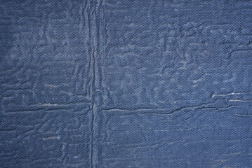 black texture from a piece of dirty plastic with cracks