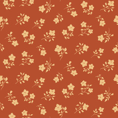 Seamless floral pattern, vintage ditsy print with pretty small flowers. Autumn botanical arrangement of simple hand drawn plants, little flowers, leaves, twigs on a terracotta background. Vector.