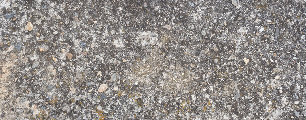 Old grey concrete wall with concrete texture for background. Front view with copy space.