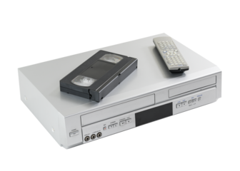 Old video cassette and disk player machine with remote controller isolated.