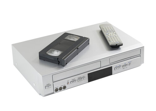 Old video cassette and disk player machine with remote controller isolated.