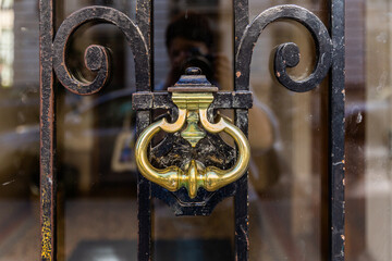 An old door in Paris on a sunny day.