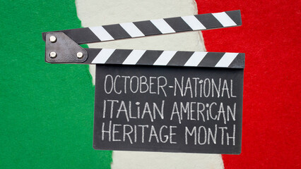 October - National Italian American Heritage Month, white chalk handwriting ion a clapboard ...