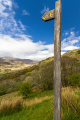 Finger footpath sign to mountain pass.