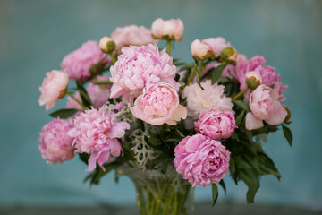 Soft pink peonies in a vase