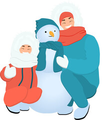 A woman and a child are making a snowman. Winter activity. 
